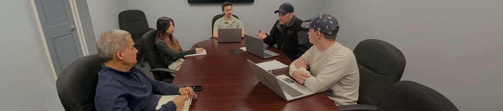 Native American Logistics team at conference table